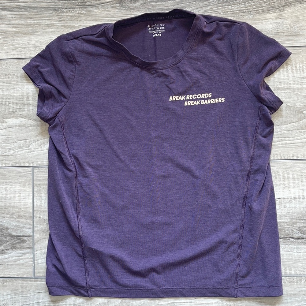 Athleta Girl - girls size medium (8/10) t shirt.  Excellent condition.
